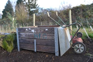 Old metre square apple crates make good compost bins, now on the NE railway border